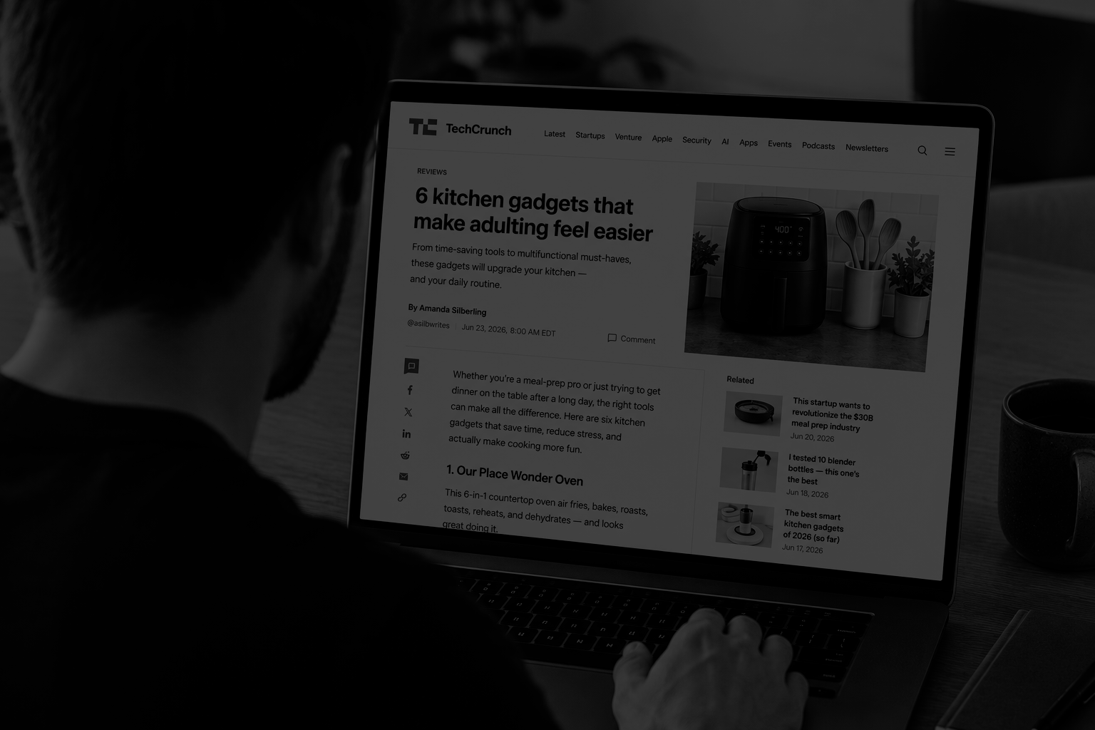 Person reading a TechCrunch-style product roundup article on a laptop screen. The image illustrates how listicles, product recommendations, reviews, and "best of" content influence brand visibility in AI search and Generative Engine Optimization (GEO) programs.